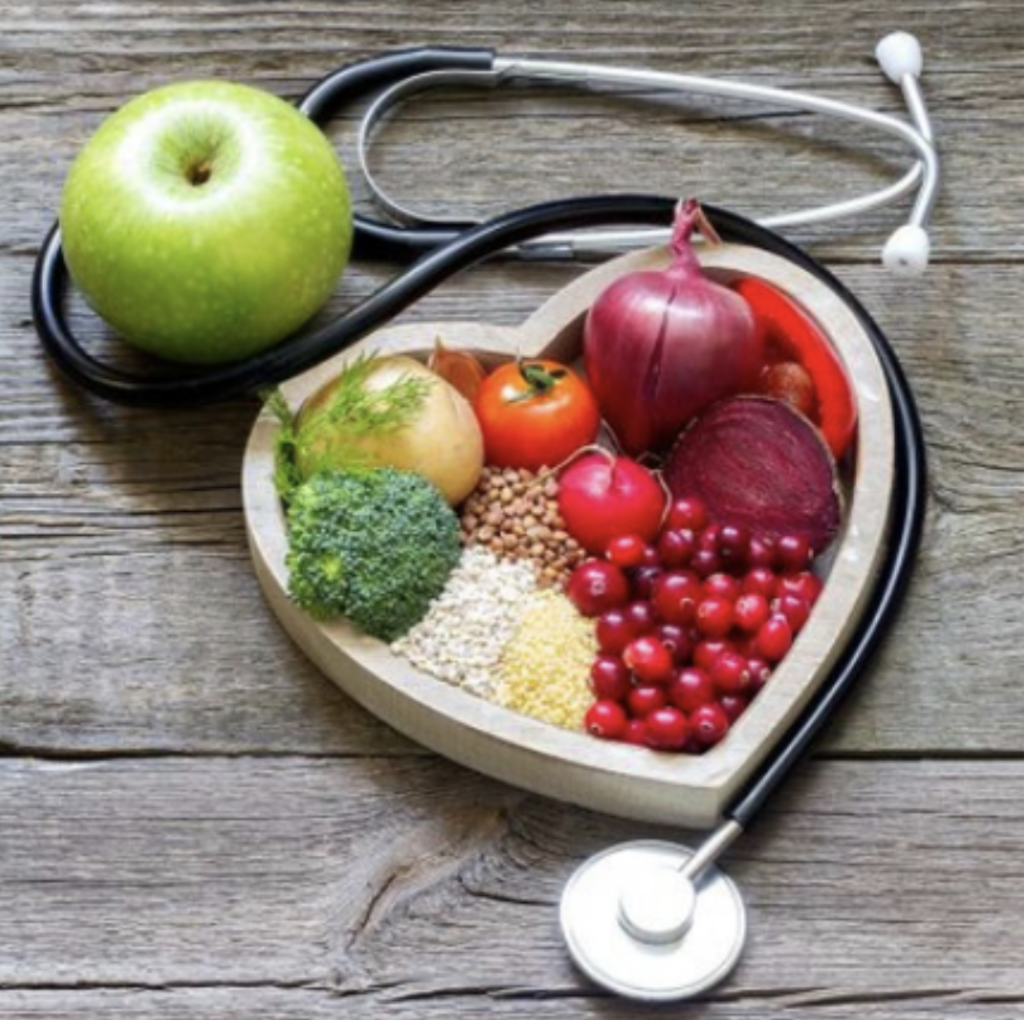 Healthy food and a stethoscope