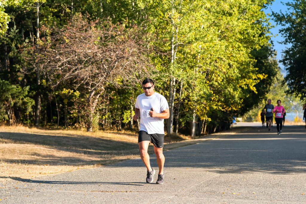 runner running on road